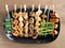 Yakitori: Japanese bite-sized food skewers: asparagus, sausage, scallop, squid, mushroom, prawns, chicken, pork, beef and okra