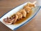 Yakitori: japanese squid skewers in sauce