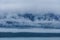 Yakutat Bay, Alaska, USA: Clouds descending on a mountainside