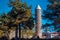 Yakutiye Madrasa minaret. Symbol of Erzurum province. Among the trees.