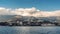 Yalta city panorama, view from water. Crimean resort on Black Sea, beautiful town at foot of mountains