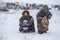 The Yamal Peninsula  the extreme north. Happy boy and girl on reindeer herder pasture in a cold winter day  polar circle  children