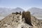 Yamchun Fortress in the Wakhan Valley near Vrang in Tajikistan. The mountains in the background are the Hindu Kush in Afghanistan