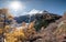 Yangmaiyong holy mountain with pine forest in autumn