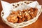 Yangnyeom chicken, Korean fried chicken with sweet and spicy sauce with crunchy nuts on it.