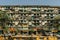 Yangon, Myanmar - January, 2020. Block of flats. Urban apartment blocks in Yangon. Facade of huge house. Dilapidated flat housing