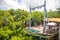 Yanoda, Hainan, China - 3.07.2019: People on panorama glass bridge in the Yanoda rain forest park on Hainan Island in