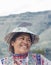 YANQUE, COLCA VALLEY, PERU - JANUARY 20, 2018: Close up of Peruvian native woman with tradicional clothes laughing in Yanque, Peru