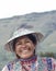 YANQUE, COLCA VALLEY, PERU - JANUARY 20, 2018: Close up of Peruvian native woman with tradicional clothes laughing in Yanque, Peru