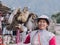 YANQUE, COLCA VALLEY, PERU - JANUARY 20, 2018: Native  woman with tradicional costume holds an eagle in the  village of Yanque,