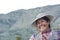 YANQUE, COLCA VALLEY, PERU - JANUARY 20, 2018: Portrait of Peruvian native woman with tradicional clothes laughing in Yanque, Peru