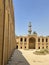 A yard and many rooms in the middle of an ancient mosque in the city of Baghdad