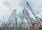 A yard of multiple industrial heavy duty high load cranes