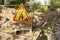 The yard road is closed with signs and a border around the street works. Sign