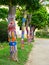 Yarn bombing in trees. European park.