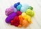 Yarn for knitting rainbow. Wood background