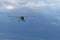 Yaslo, Poland - july 1 2018: A light sport turboprop aircraft flies across the sky among the rainy clouds. Landing in difficult we