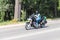 Yaslo, Poland - july 12 2018:The biker rides a stylish chopper on an asphalt road. Cruise on an iron horse. The life style of the