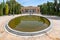 Yazd, Iran - 14.04.2019: People in front of Zoroastrian fire temple of Yazd, Iran on a sunny day of spring