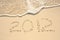 The Year 2012 Written in Sand on Beach