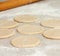 Yeast dough with flour. Making apple pies.