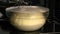 Yeast dough rising in glass bowl. Dough, resting and rising in bulk fermentation. Dough-rise