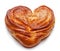 Yeast sweet buns in the shape of a heart on an white. Country house style. Authentically