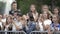 Yekaterinburg, Russia-August, 2019: Crowd of people clap their hands at summer festival. Action. Crowd with young people