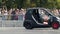 Yekaterinburg, Russia-August, 2019: Racer drifts on mini car. Action. Man spinning in car at motorcycle festival