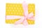 Yello dotted gift box, white background.