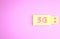 Yellow 5G modem for fast mobile Internet icon isolated on pink background. Global network high speed connection data