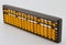 Yellow abacus Is plastic placed on a white background