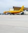 Yellow Airbus A300-600 DHL parcel delivery plane in Airport