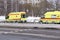 Yellow ambulance on the street of the city.