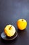 Yellow apple and apple without a peel on a dark background. Healthy food concept