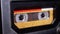 Yellow Audio Cassette in the Tape Recorder Playing and Rotates
