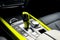 Yellow Automatic gear stick of a modern car. Modern car interior details. Close up view. Car detailing. Automatic transmission lev