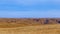 Yellow autumn Ural mountains under a blue sky. Landscape