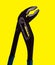 Yellow background. Adjustable wrench tool. professional maintenance concept. Repair and water pipe renewal. Elimination of