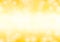 Yellow background bokeh glittering luxury abstract light sparkling blurred gradient