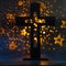 On a yellow background with stars is a large Catholic cross. Symbol of faith, spirituality, love. Religion, Christianity,