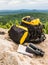 Yellow Backpack with tourist equipment binoculars map travel tourism view