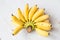 Yellow banana group on wooden background