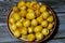 Yellow Barhi dates, botanically classified as Phoenix dactylifera, fruits of a date palm belonging to the Arecaceae family, native