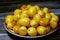 Yellow Barhi dates, botanically classified as Phoenix dactylifera, fruits of a date palm belonging to the Arecaceae family, native