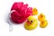 Yellow bath ducks and bath puff