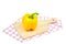 Yellow bell peppers on a wooden cutting board,