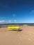 Yellow benches on the beach, nature, seashore