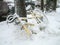 Yellow bicycle buried in the snow