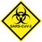 Yellow biohazard sign with SARS-CoV-2 text